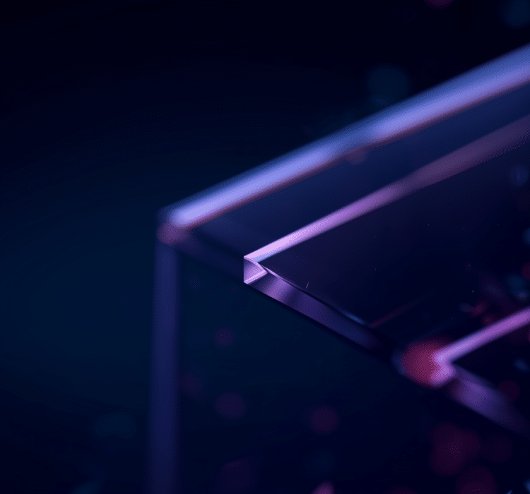 Close-up of clear, purple-tinted acrylic or glass sheets stacked at an angle, with a dark background and soft, out-of-focus light reflections—evoking the layered protection of enterprise security and dynamic threat intelligence.