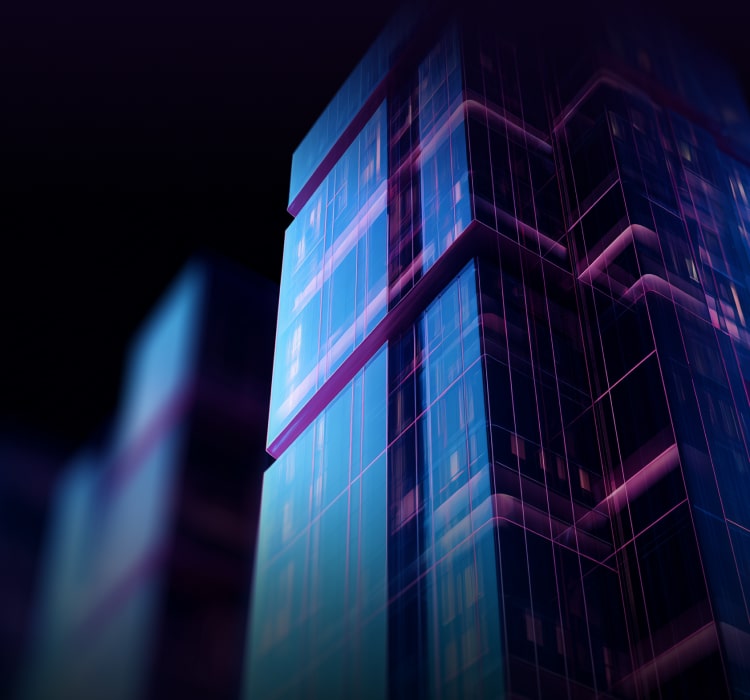 Glass skyscrapers with blue and purple lighting reflecting off their surfaces evoke a modern city empowered by enterprise security and advanced cybersecurity measures against the dark background.